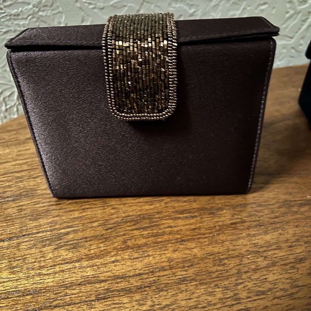Dark brown satin evening bag.